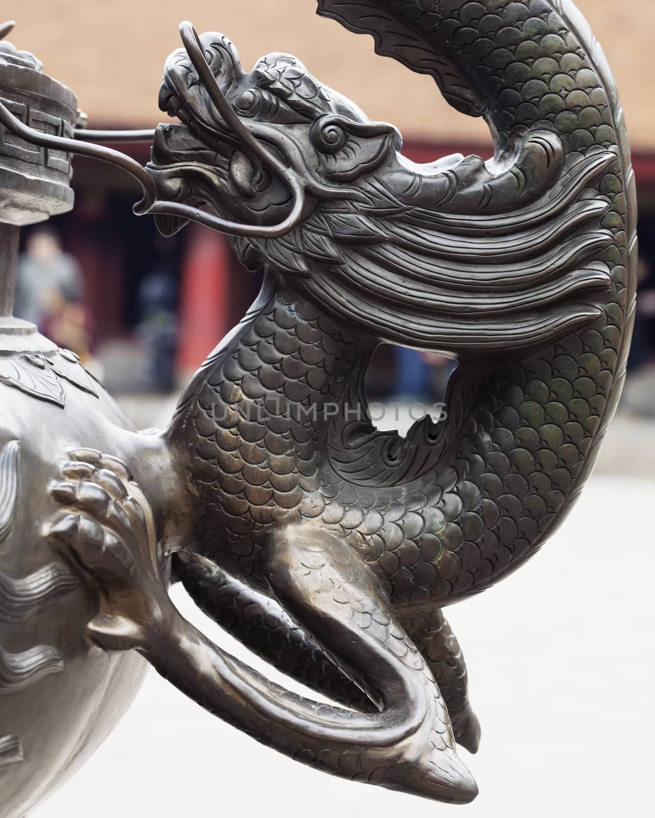 Dragon sculpture in a temple in Hanoi, Vietnam by Goodday
