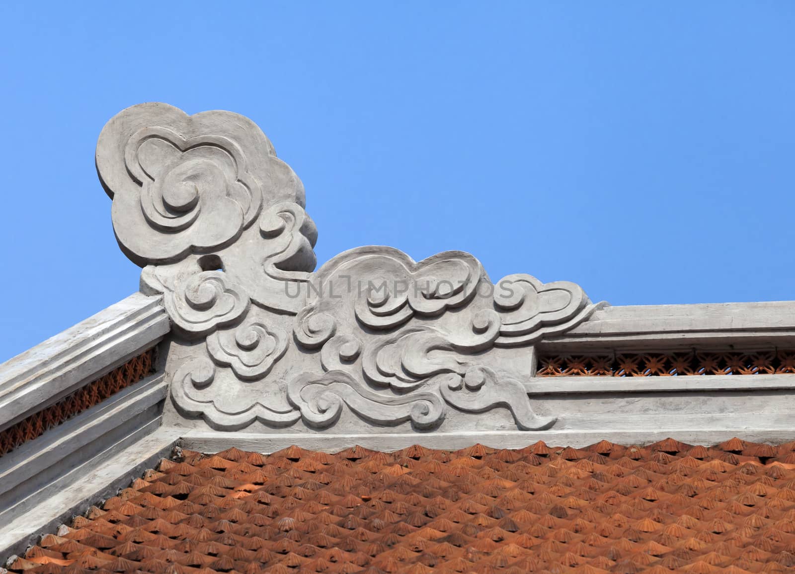 Decoration on a temple roof in Vietnam by Goodday