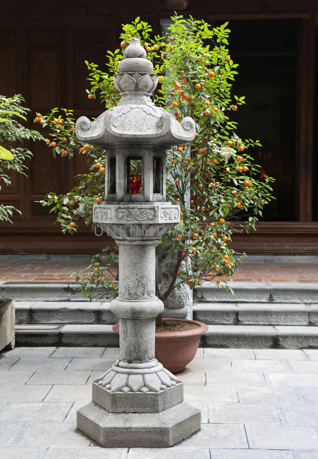 Stone buddhist lamp in a japanese garden
