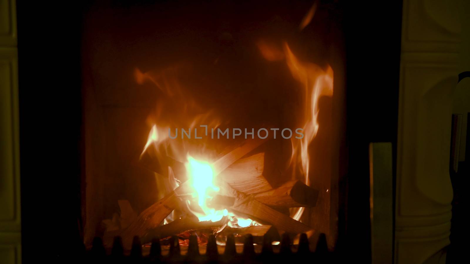 Fire in stove, close up, firewood burning by asafaric