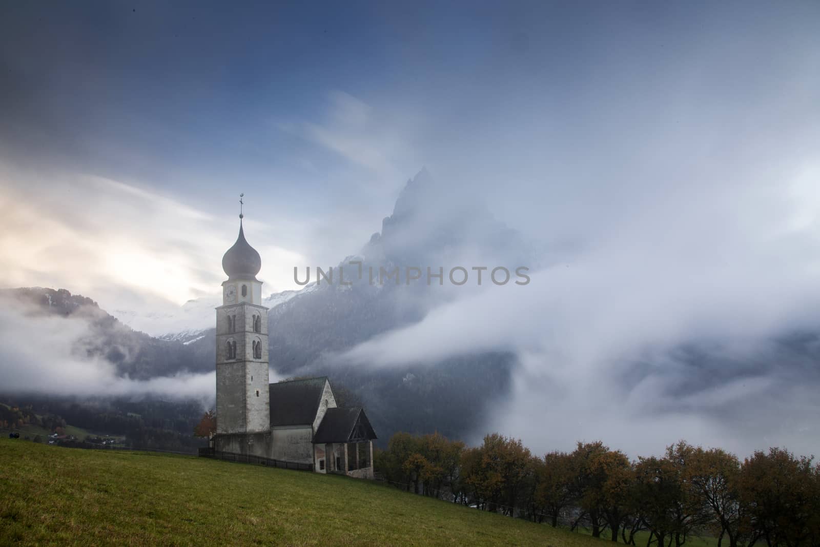 san Valentino church on a foggy late autumn day, Siusi allo Sciliar, Castelrotto, Dolomites, Italy