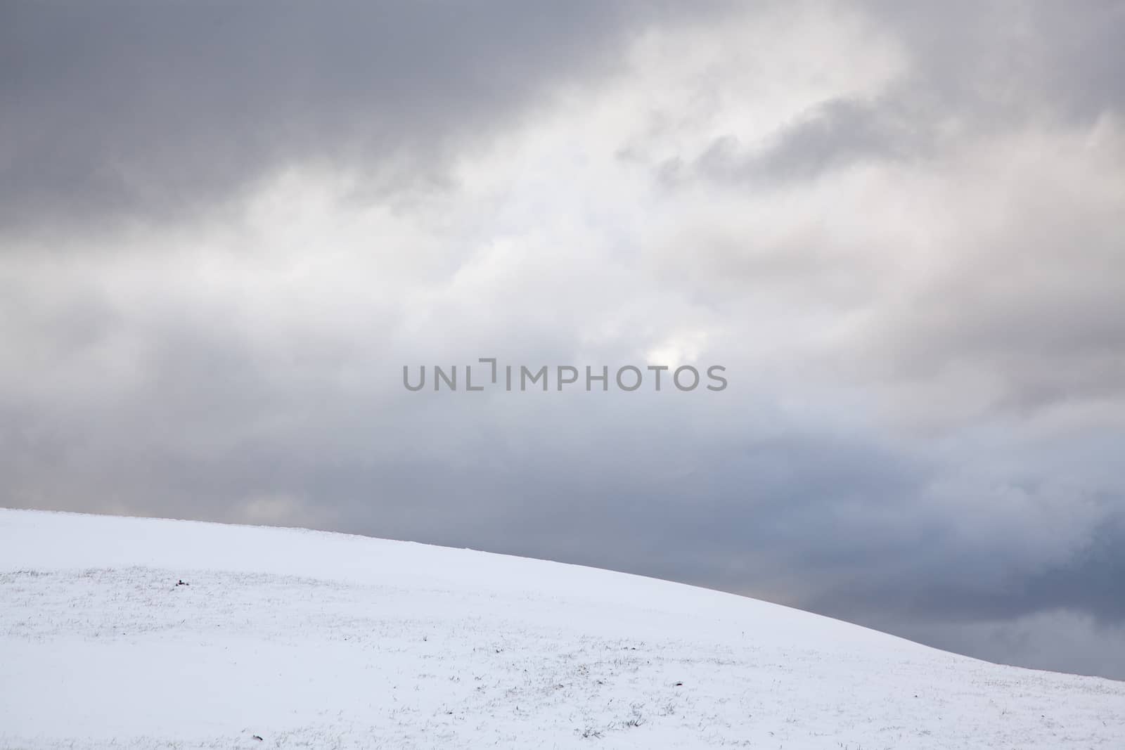snowy hill and blue sky by melis