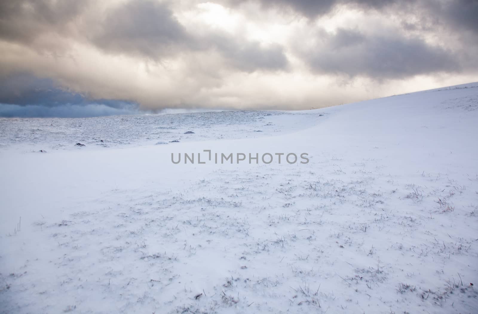 snowy hill and blue sky