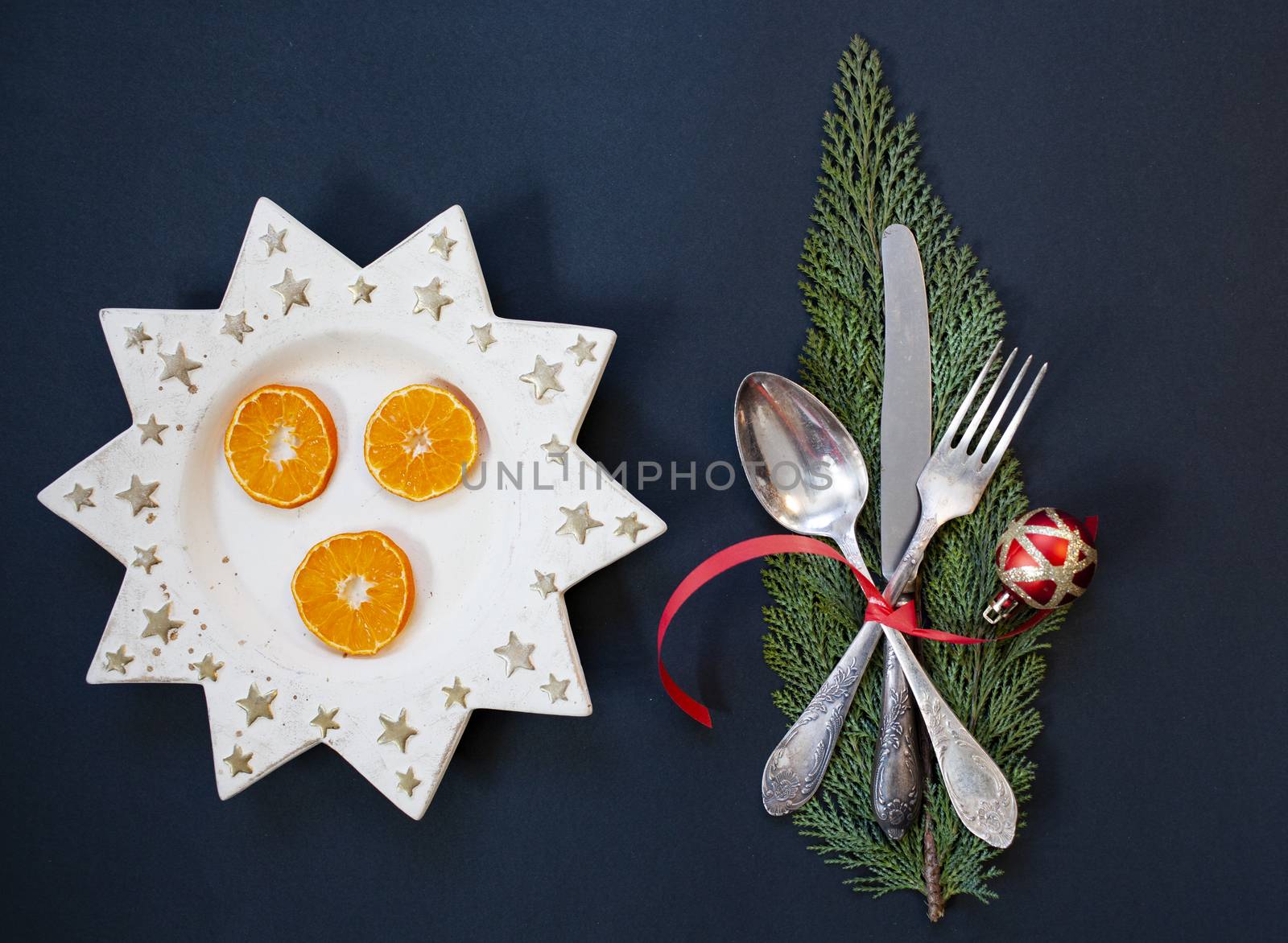 flat lay of festive Christas table arrangement with silverware by melis