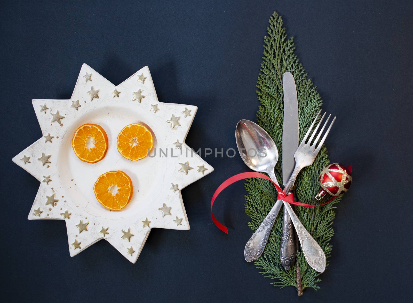 flat lay of festive Christas table arrangement with silverware