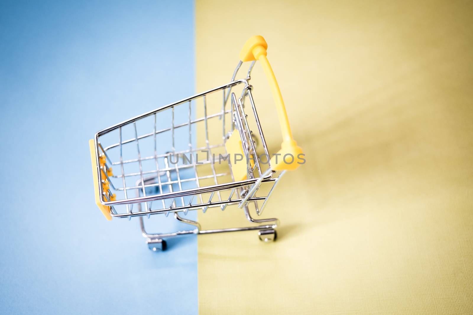 yellow shopping cart by melis