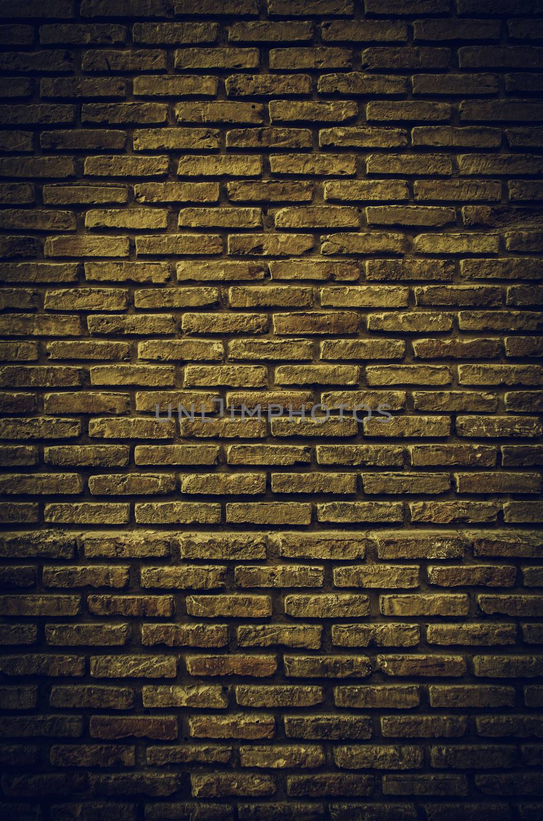 Fund damaged brick wall, detail of old bricks in the city, textured background