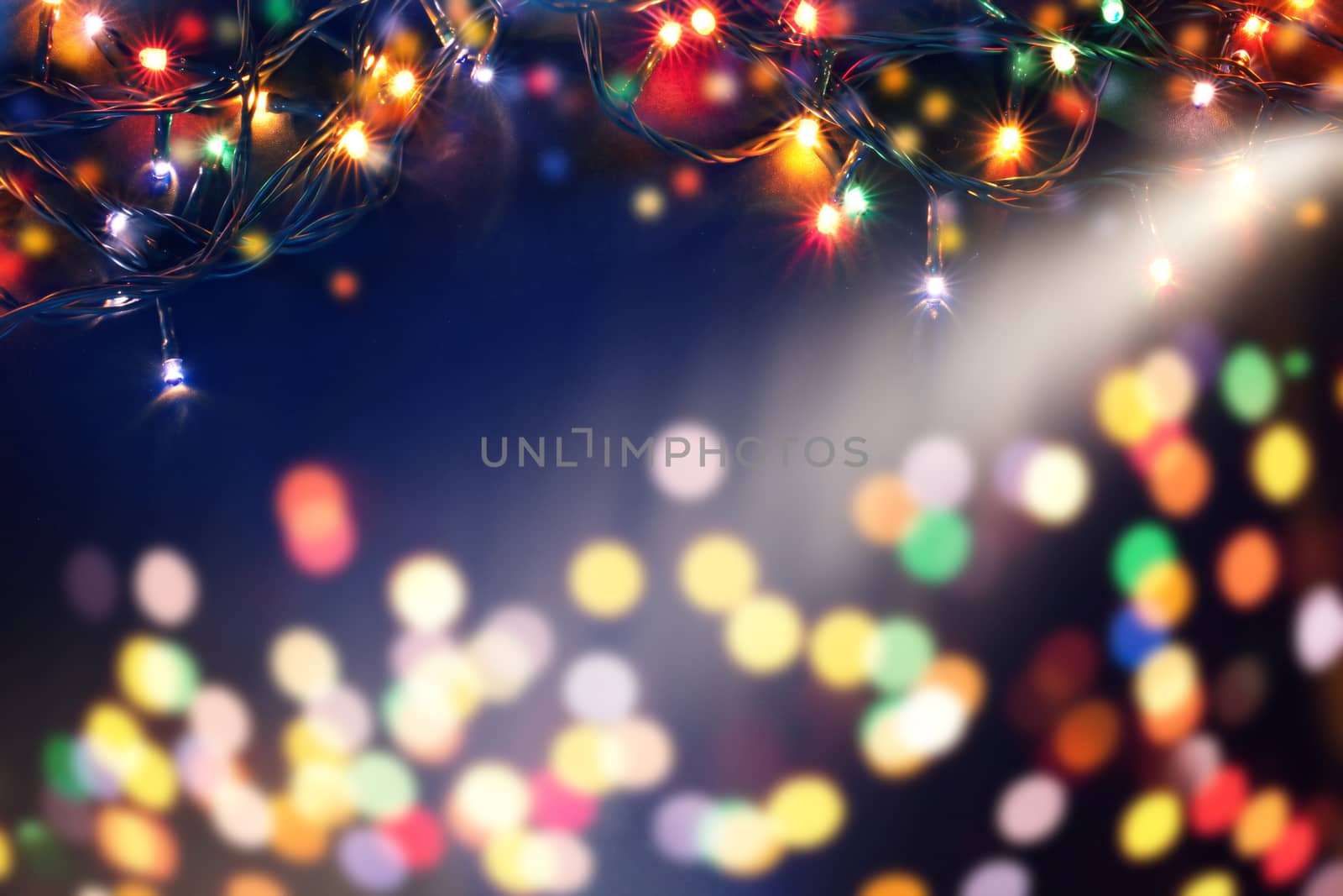 magic holiday background with blurred bokeh of Christmas lihjts