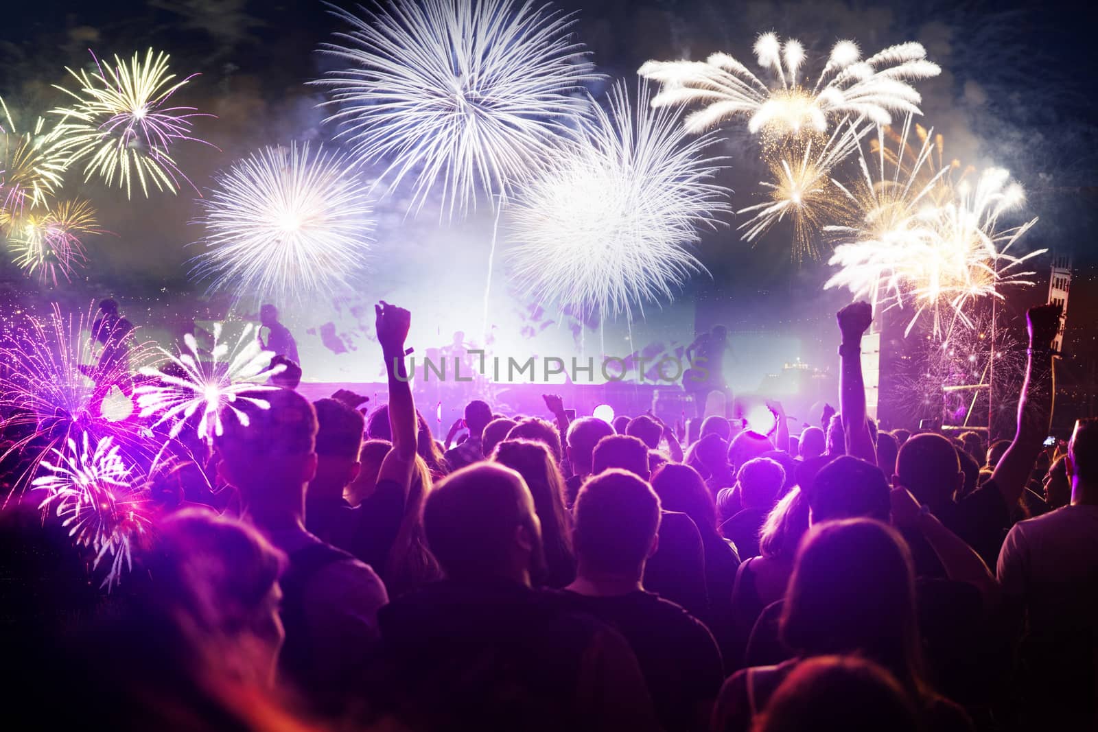 crowd watching fireworks - New Year celebrations- abstract holiday background