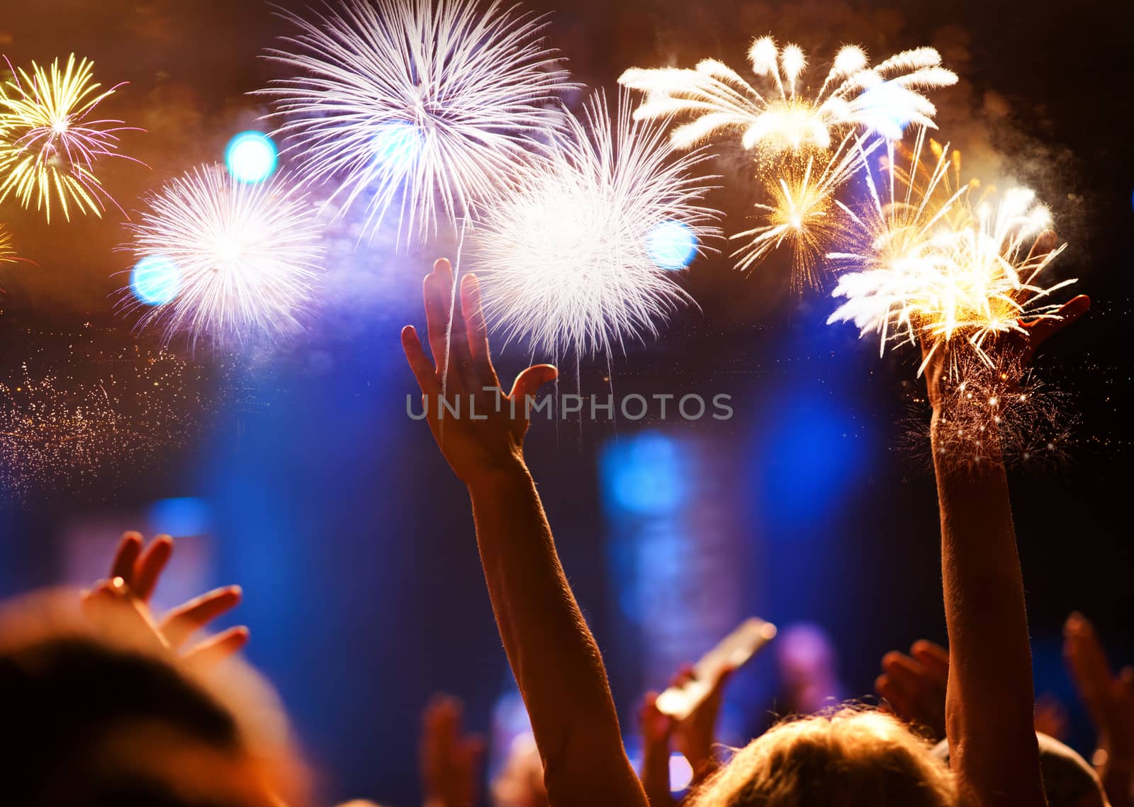 crowd watching fireworks - New Year celebrations- abstract holiday background