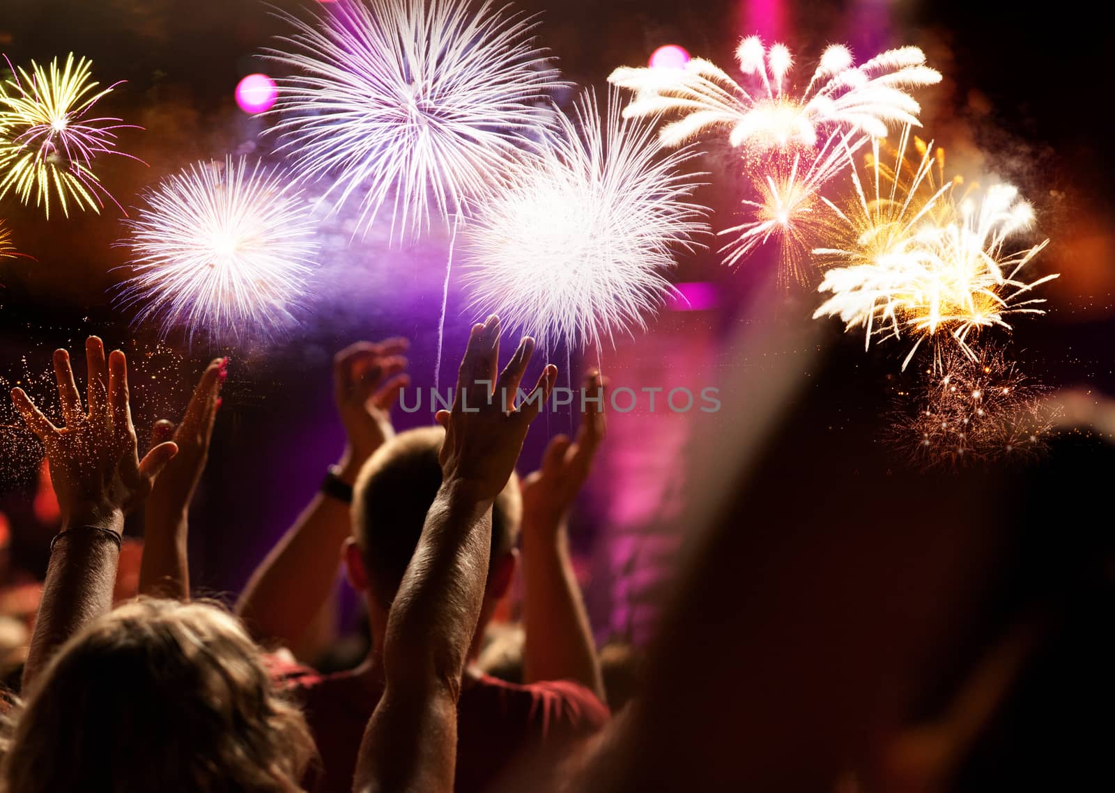 crowd watching fireworks - New Year celebrations- abstract holid by melis