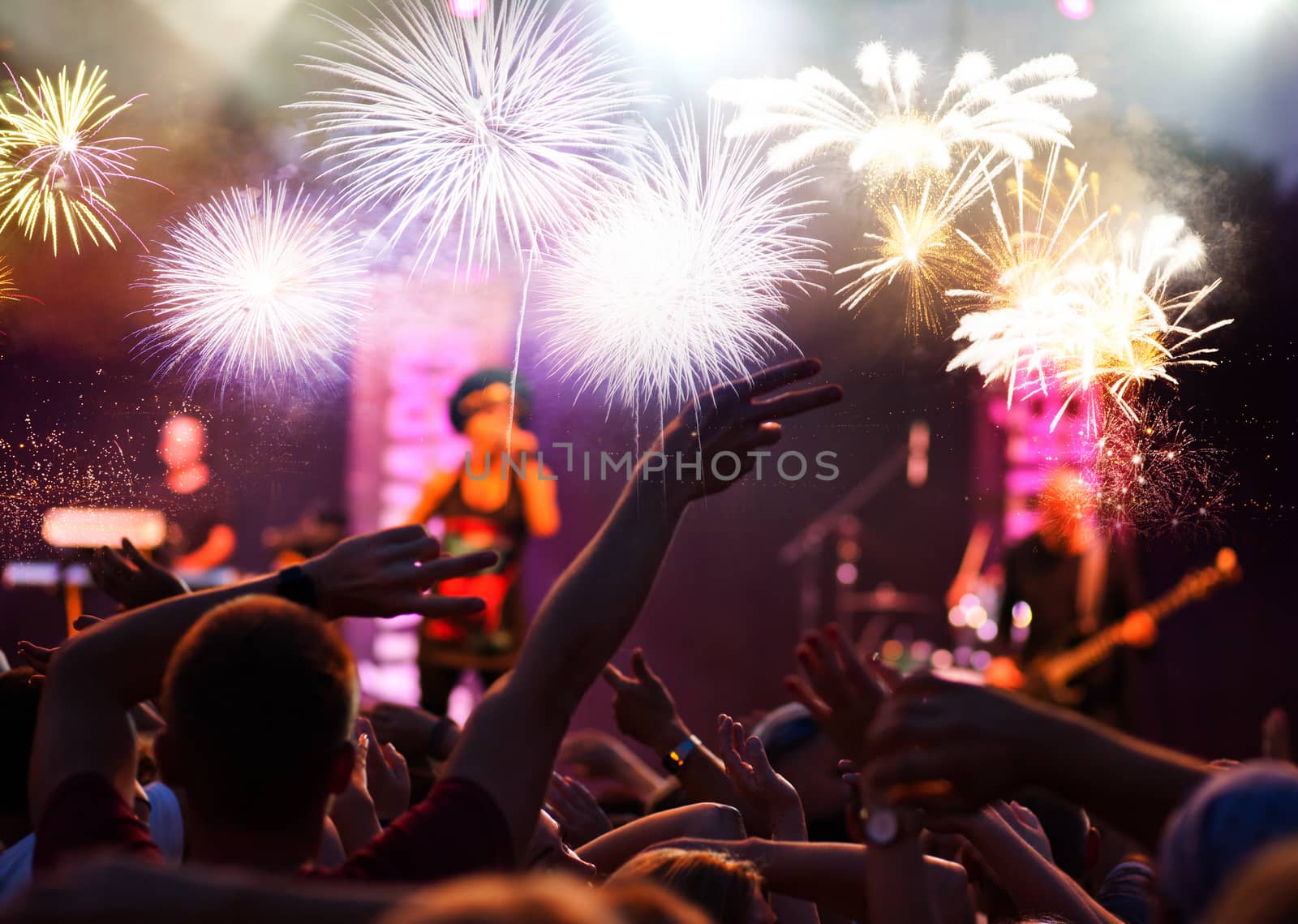 crowd watching fireworks - New Year celebrations- abstract holiday background