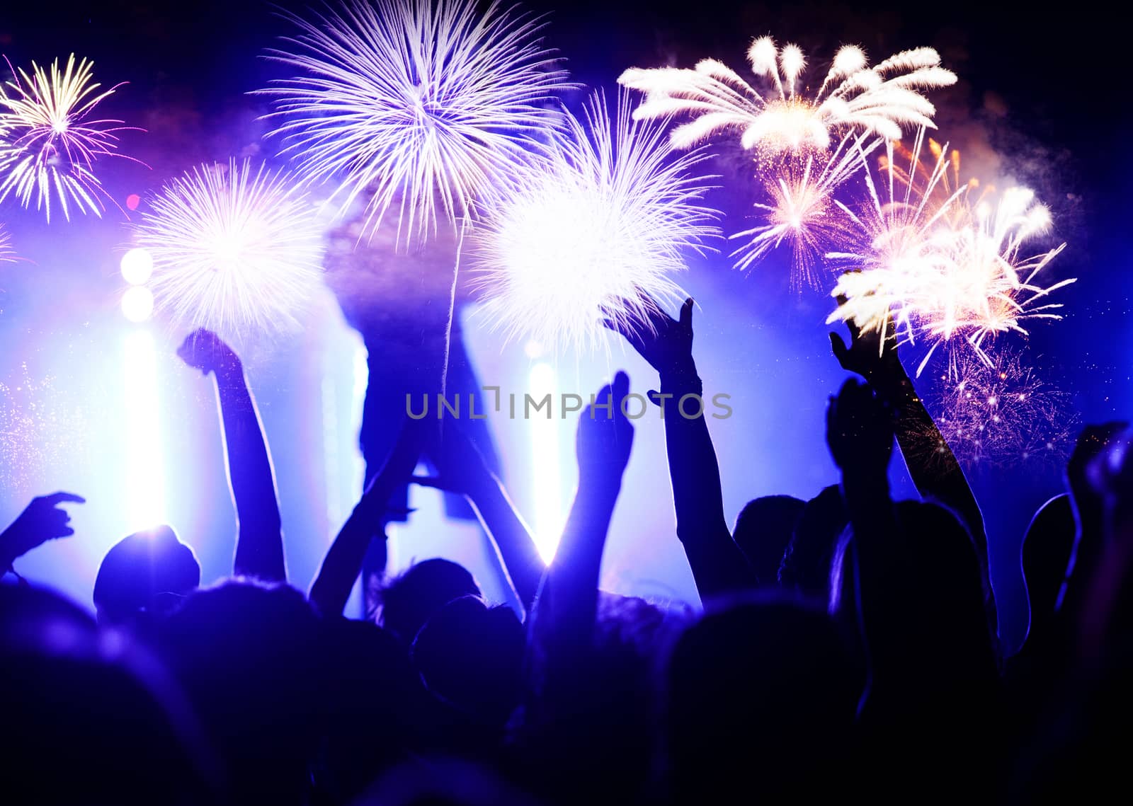crowd watching fireworks - New Year celebrations- abstract holid by melis