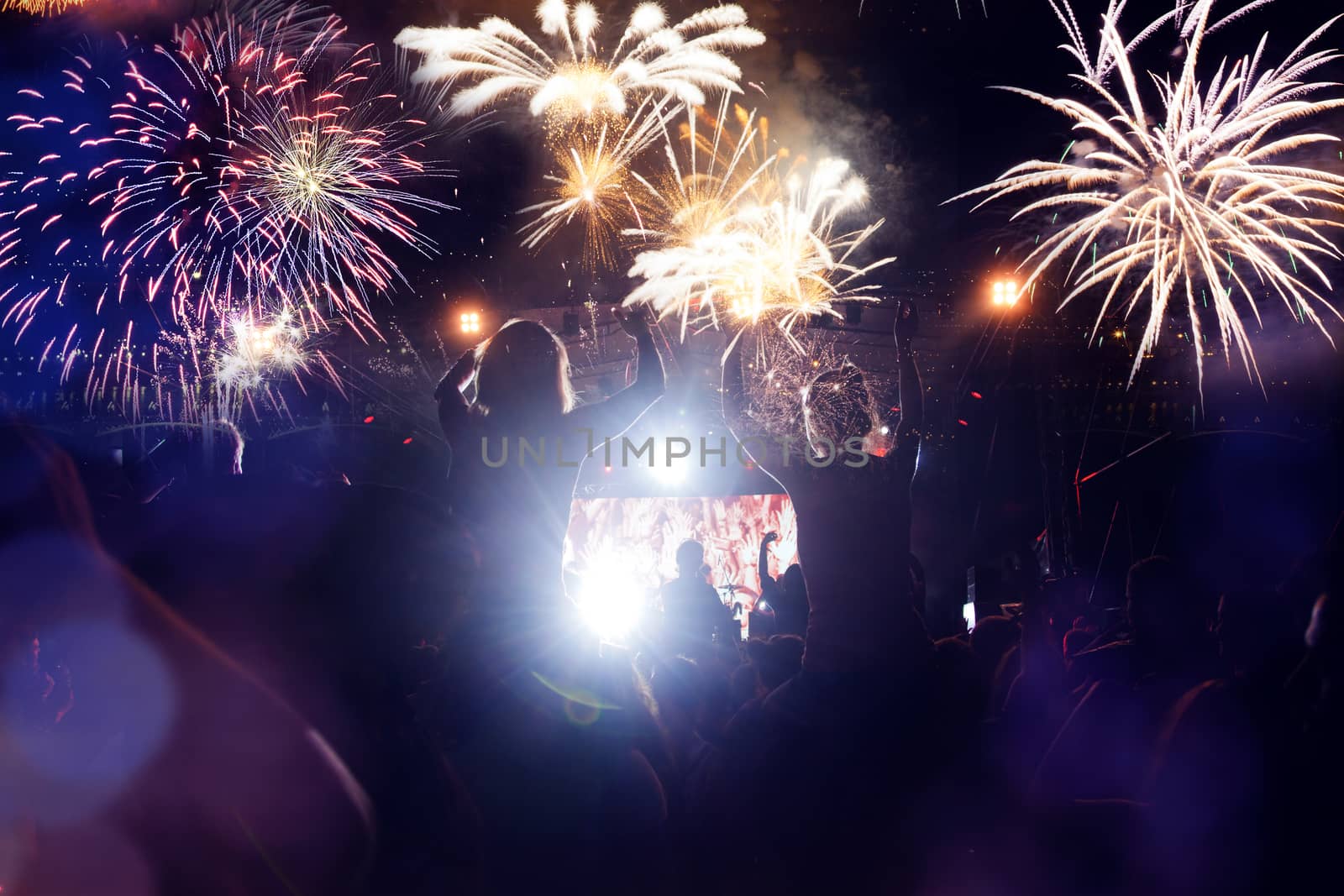 crowd watching fireworks - New Year celebrations- abstract holid by melis