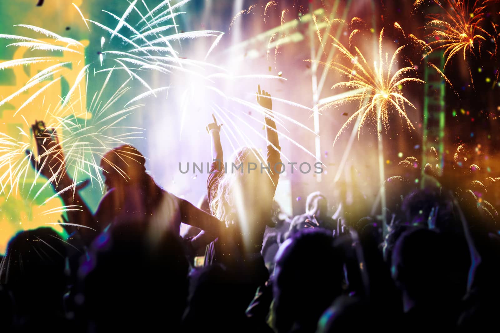 crowd watching fireworks - New Year celebrations- abstract holiday background