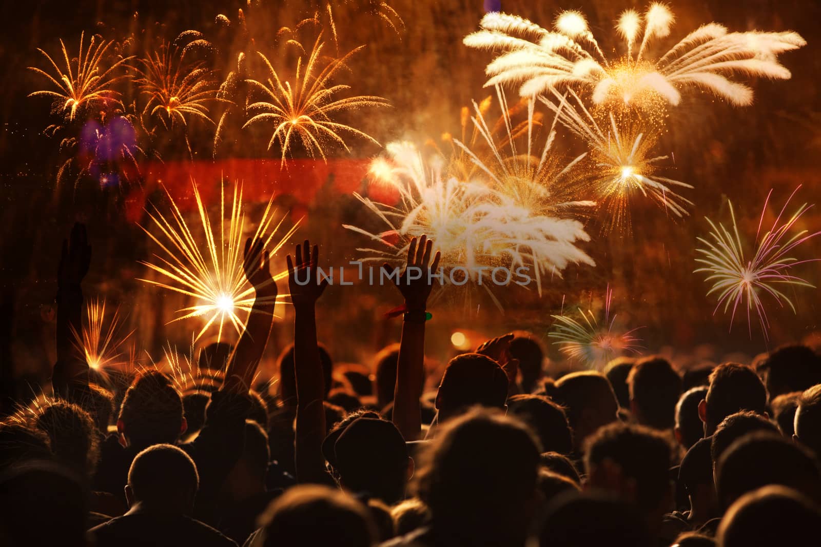 crowd watching fireworks - New Year celebrations- abstract holiday background