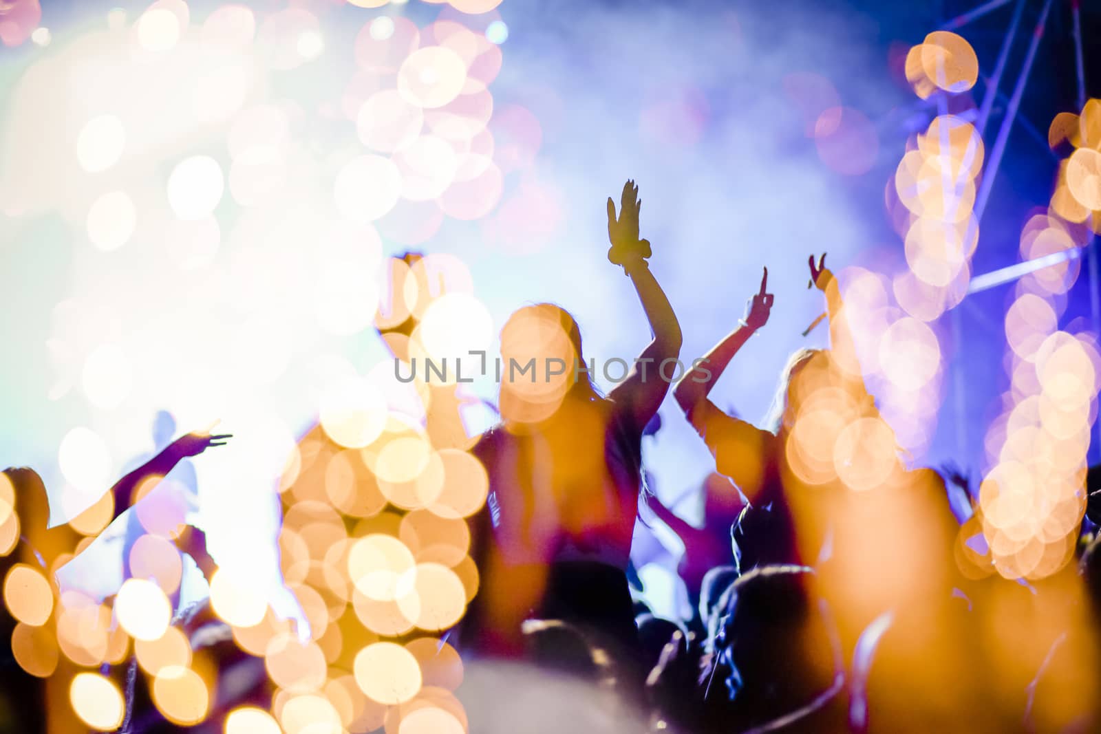 crowd watching fireworks - New Year celebrations- abstract holiday background