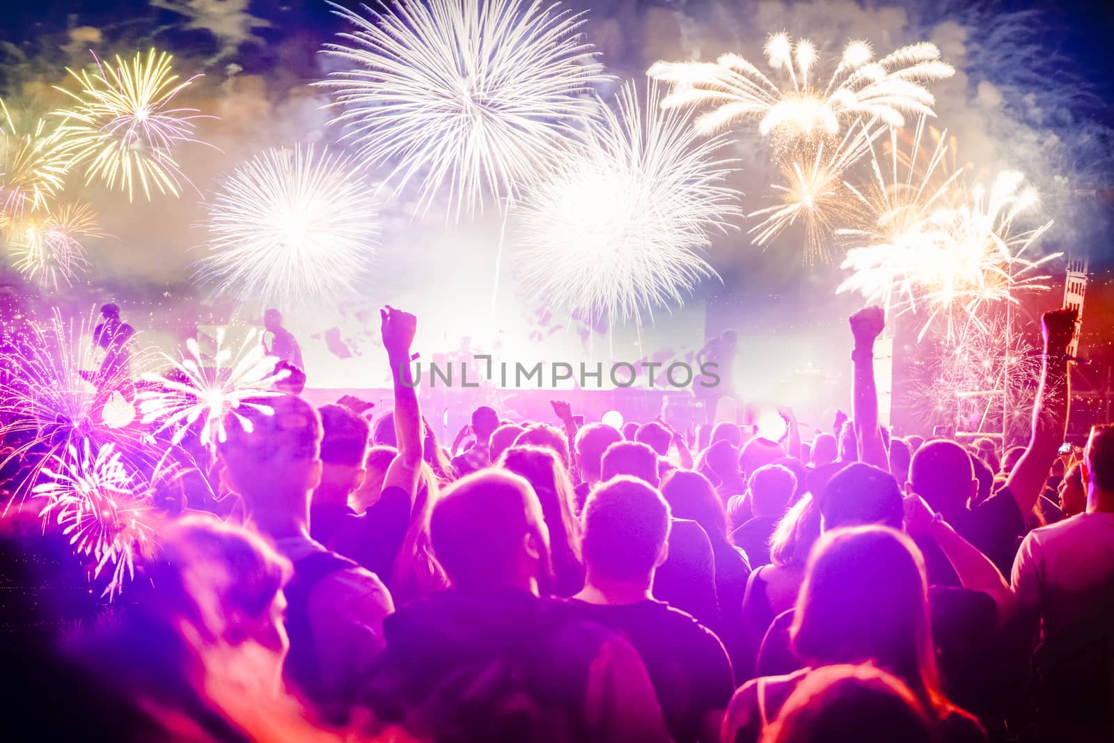 crowd watching fireworks - New Year celebrations- abstract holiday background