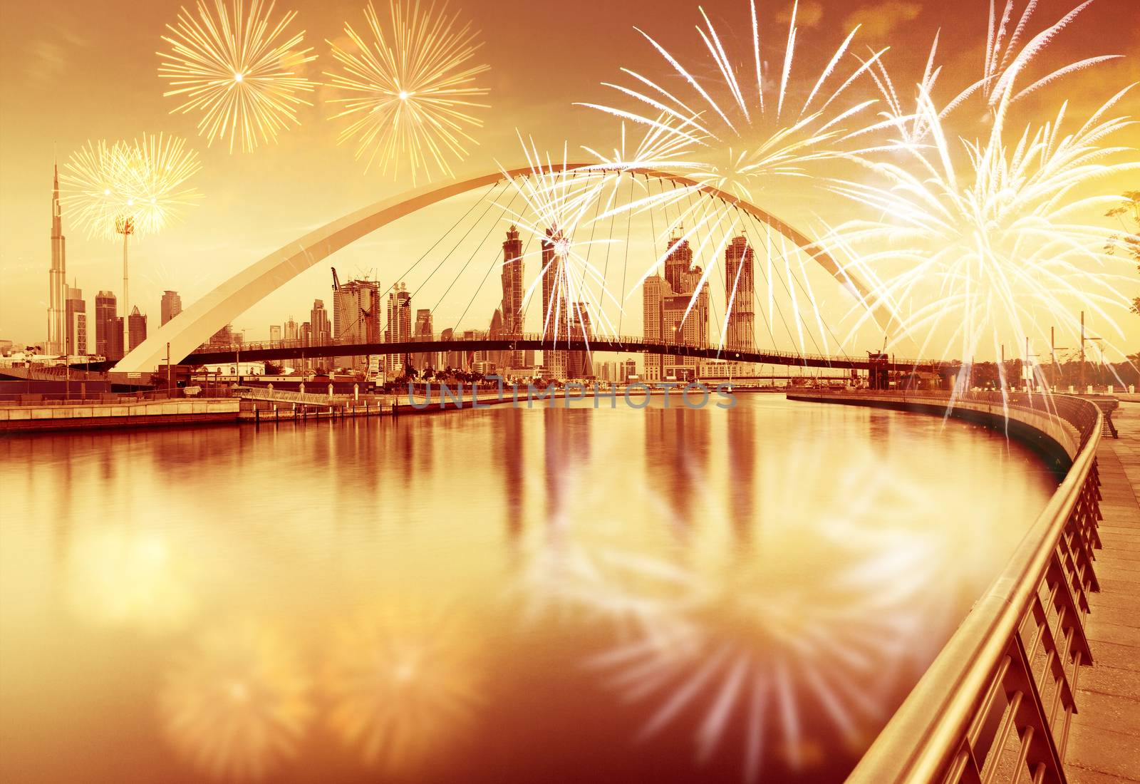 fireworks around Tolerance bridge - exotic New Year destination, Dubai, UAE