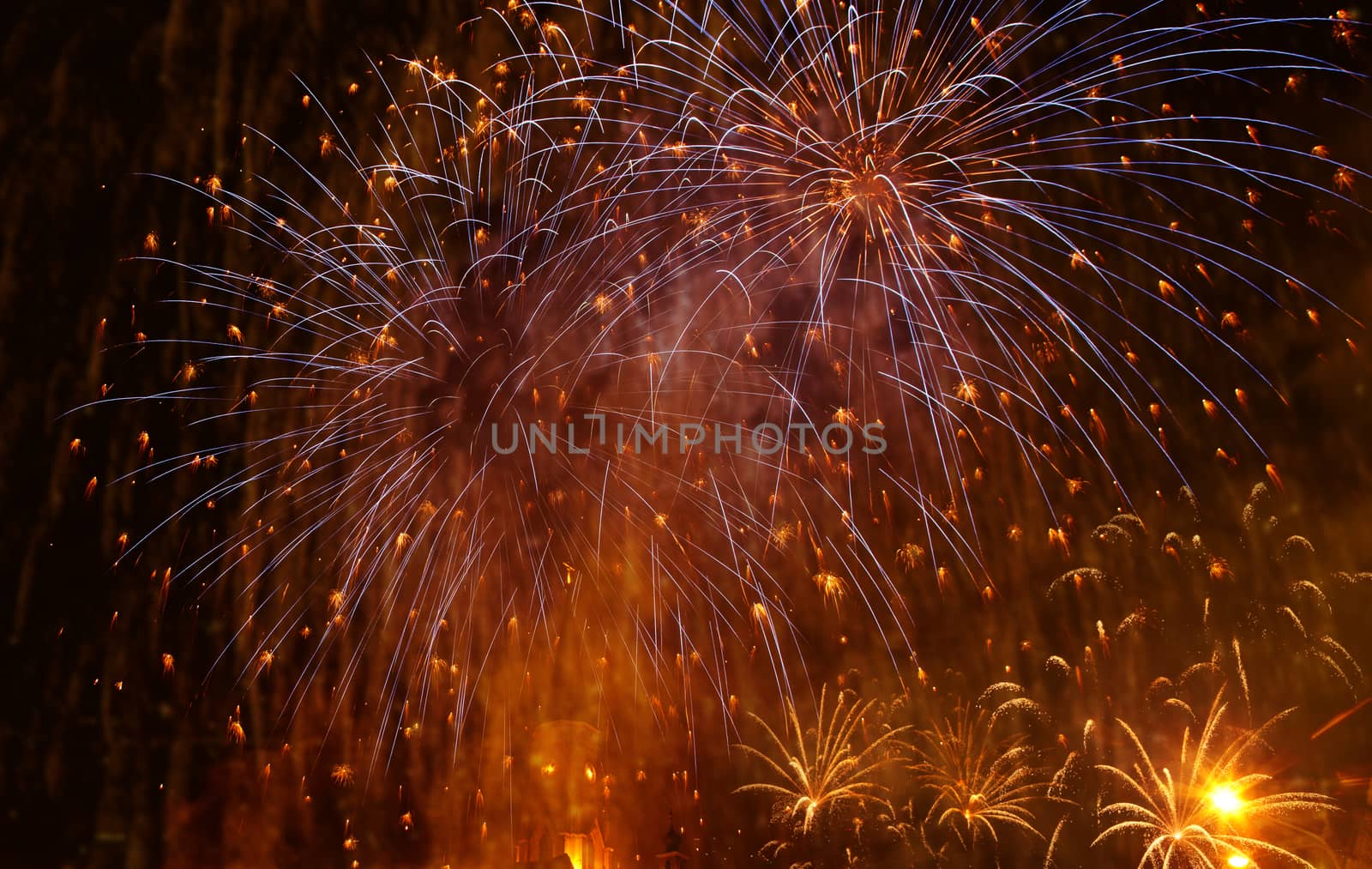 beautiful colorful fireworks at New Year and copy space - abstract holiday background