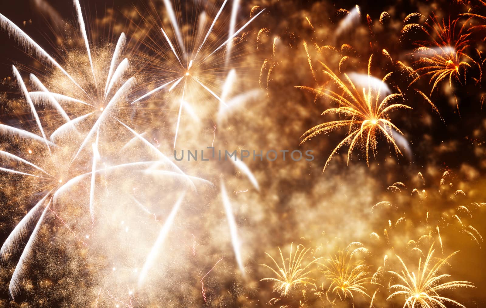 beautiful colorful fireworks at New Year and copy space - abstract holiday background