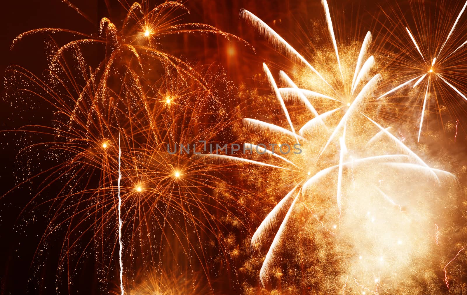 beautiful colorful fireworks at New Year and copy space - abstract holiday background
