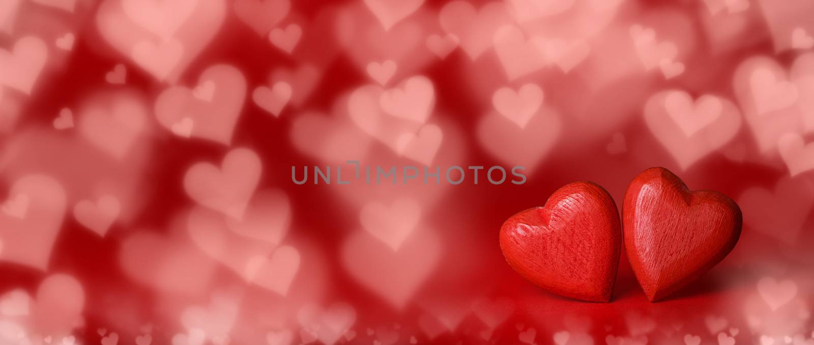 Red hearts on bokeh background by Yellowj