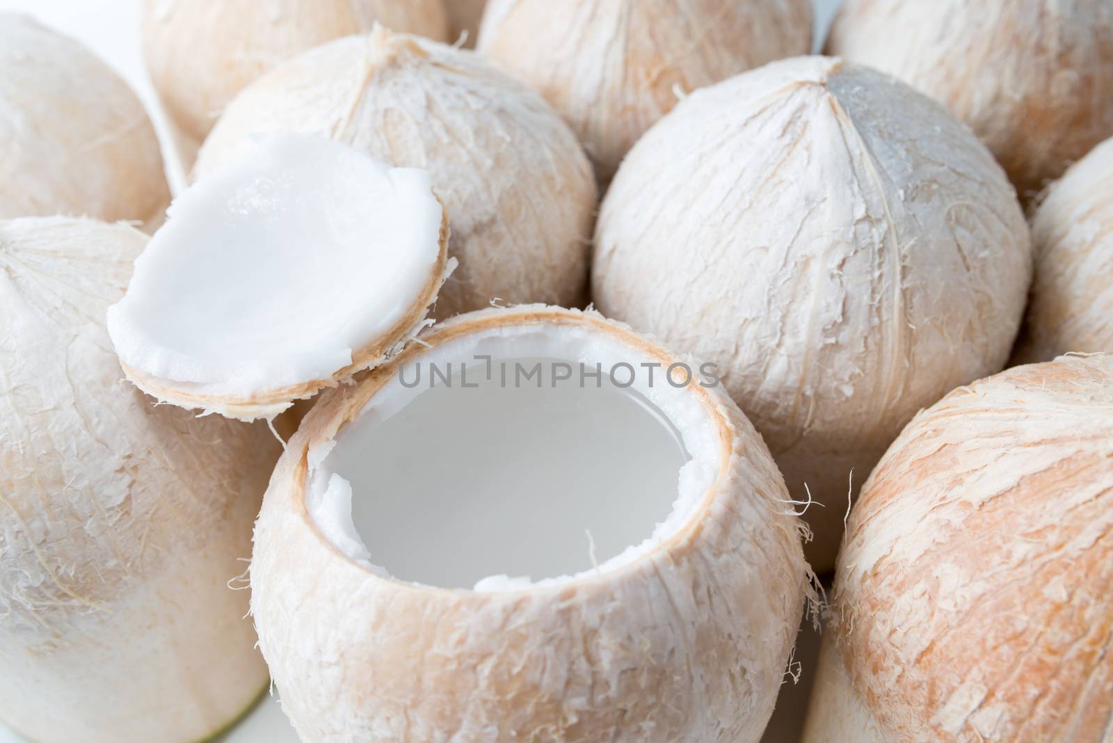 coconuts water with coconuts background