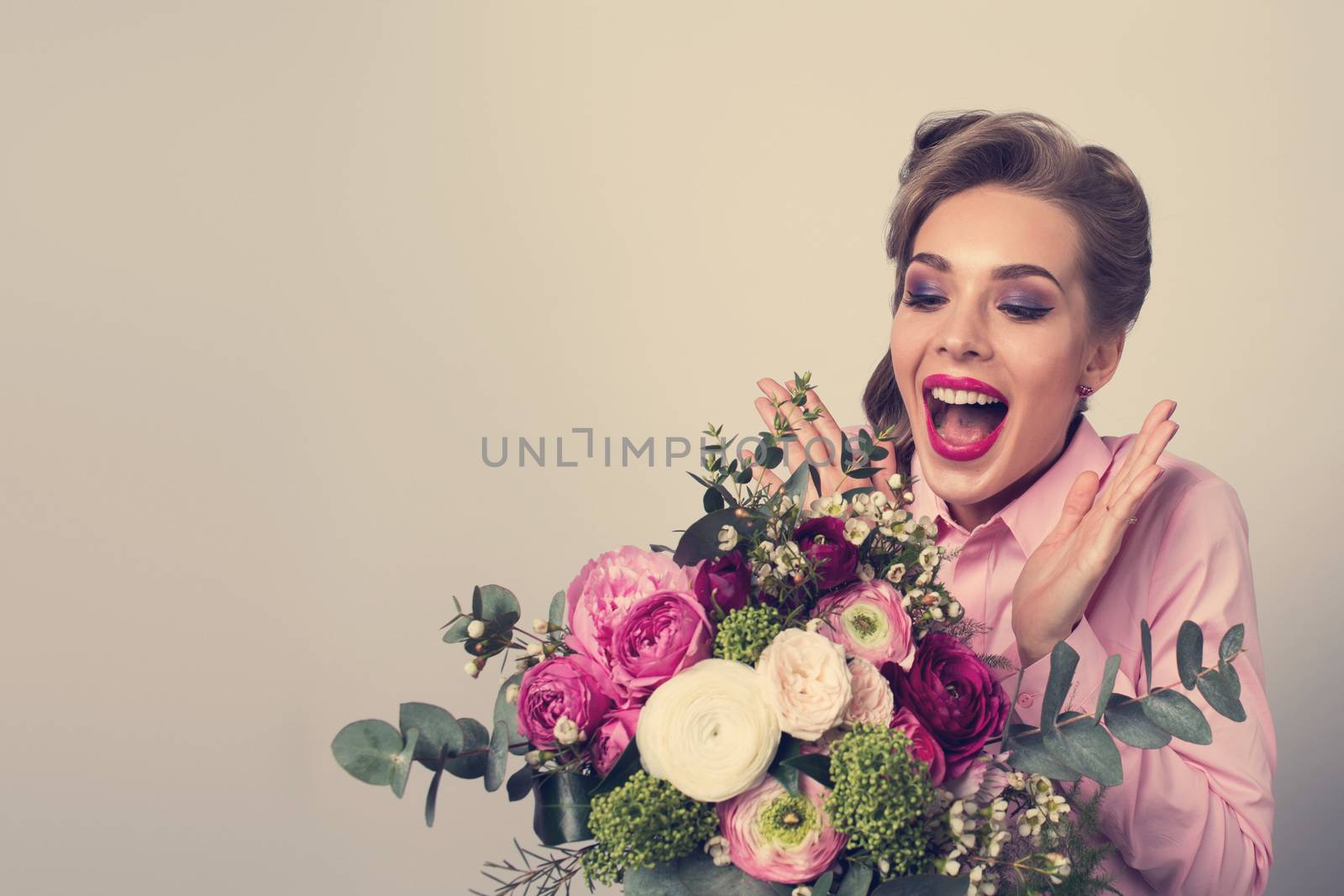 Woman surprised with bunch of flowers by ALotOfPeople