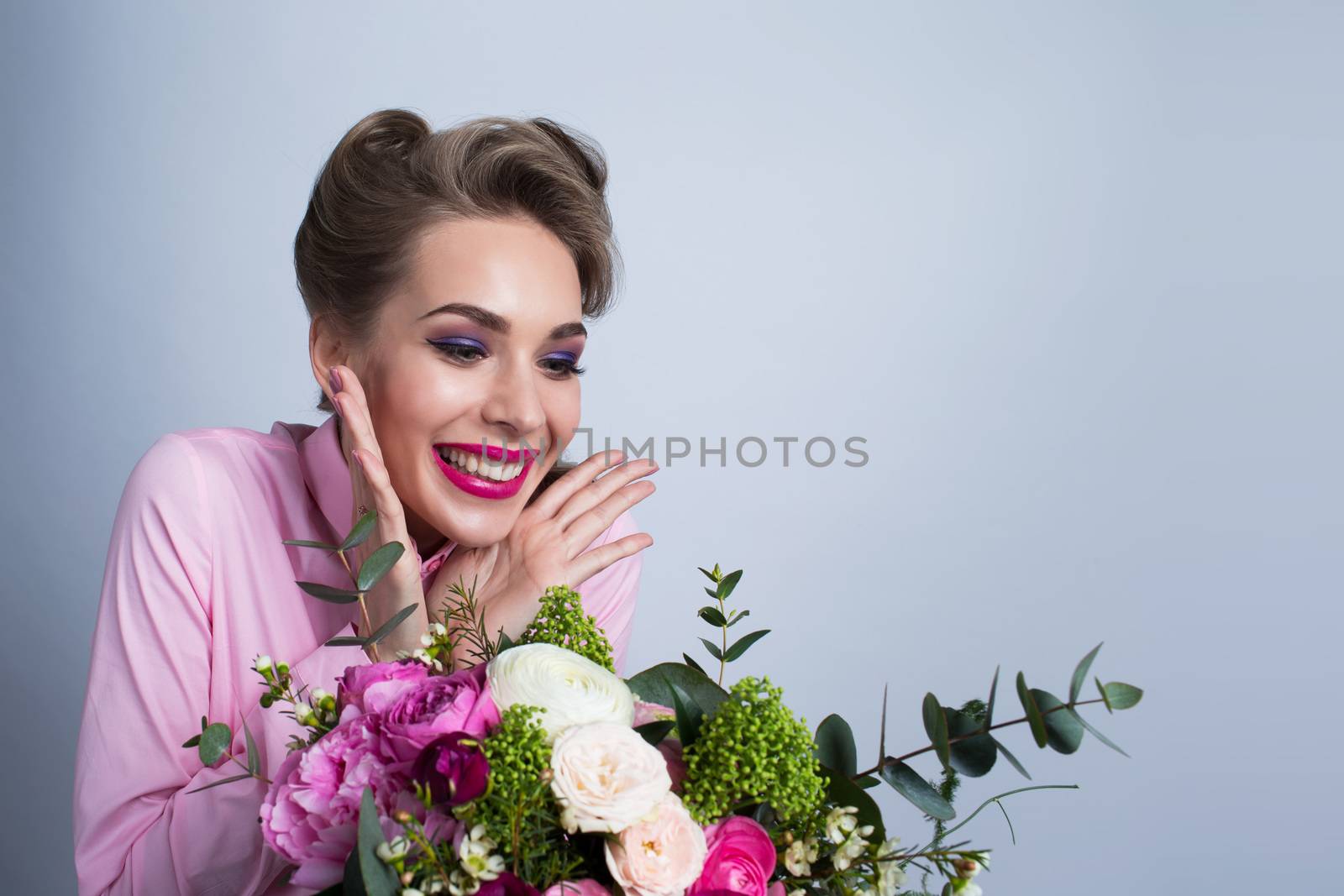 Woman surprised with bunch of flowers by ALotOfPeople