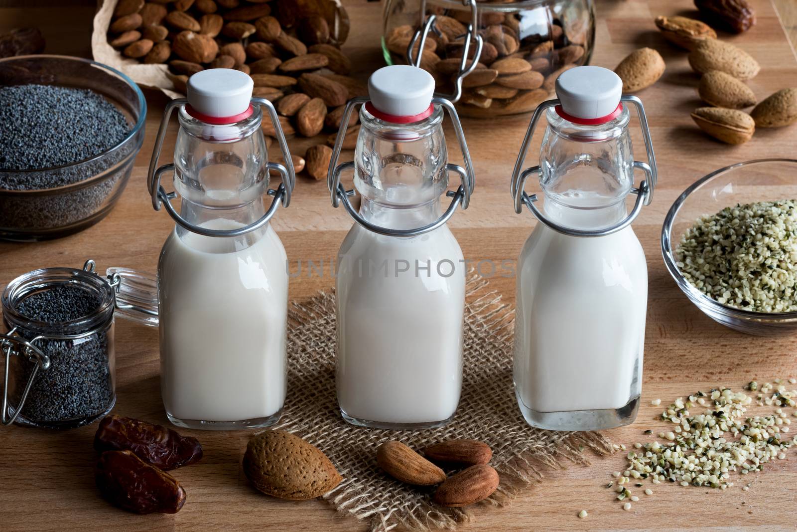 Vegan plant milks - almond milk, poppy seed milk and hemp seed m by madeleine_steinbach