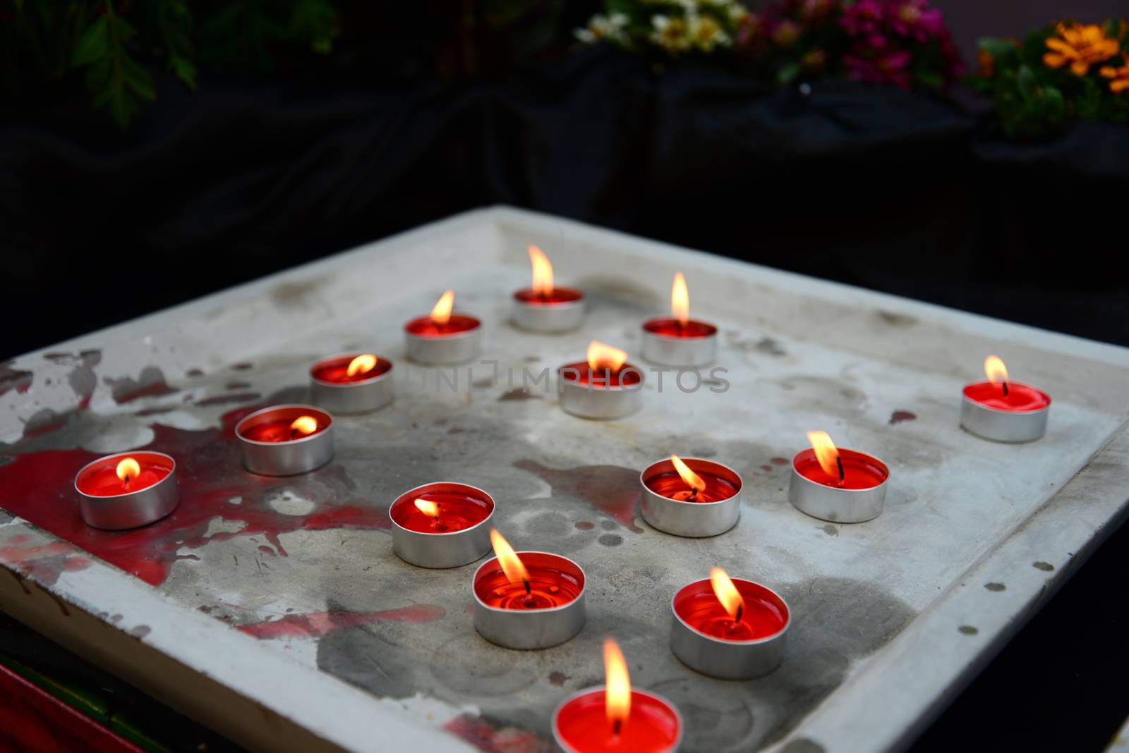 Colorful of Aroma Candles on the Cement tray
