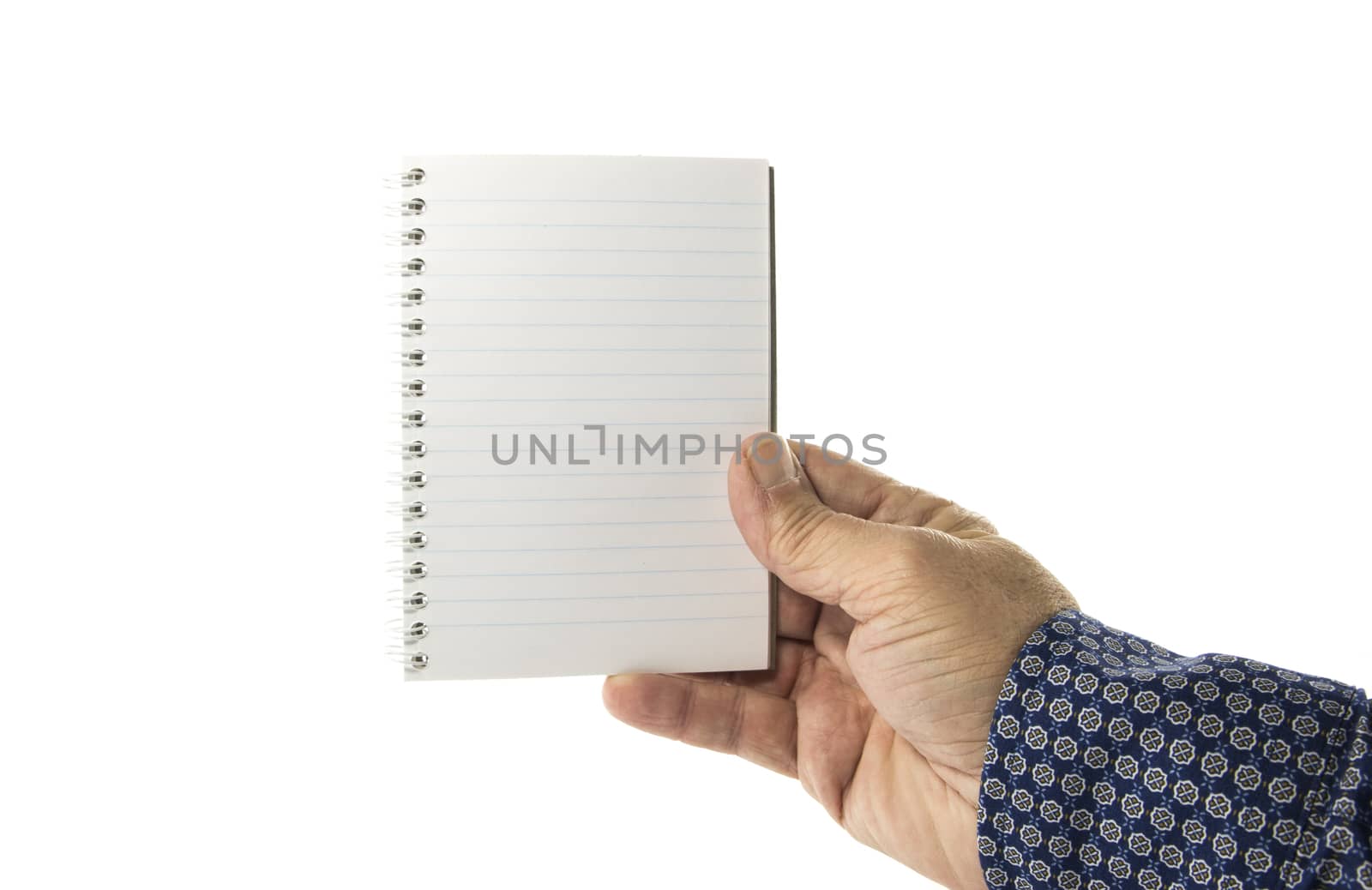 Hand holding blank plain white ring binder  by compuinfoto