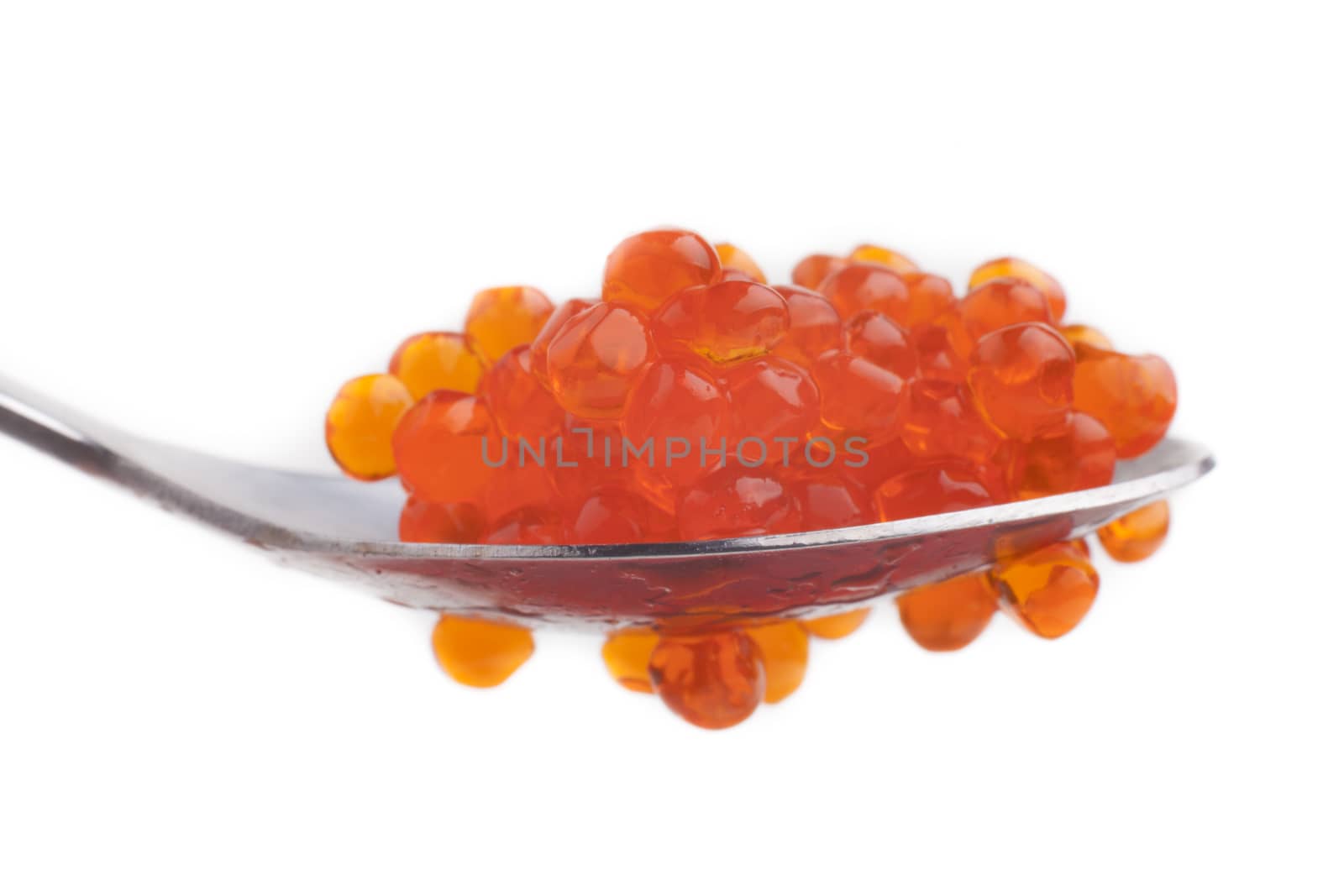 Read caviar with silver color spoon isolated  on white background