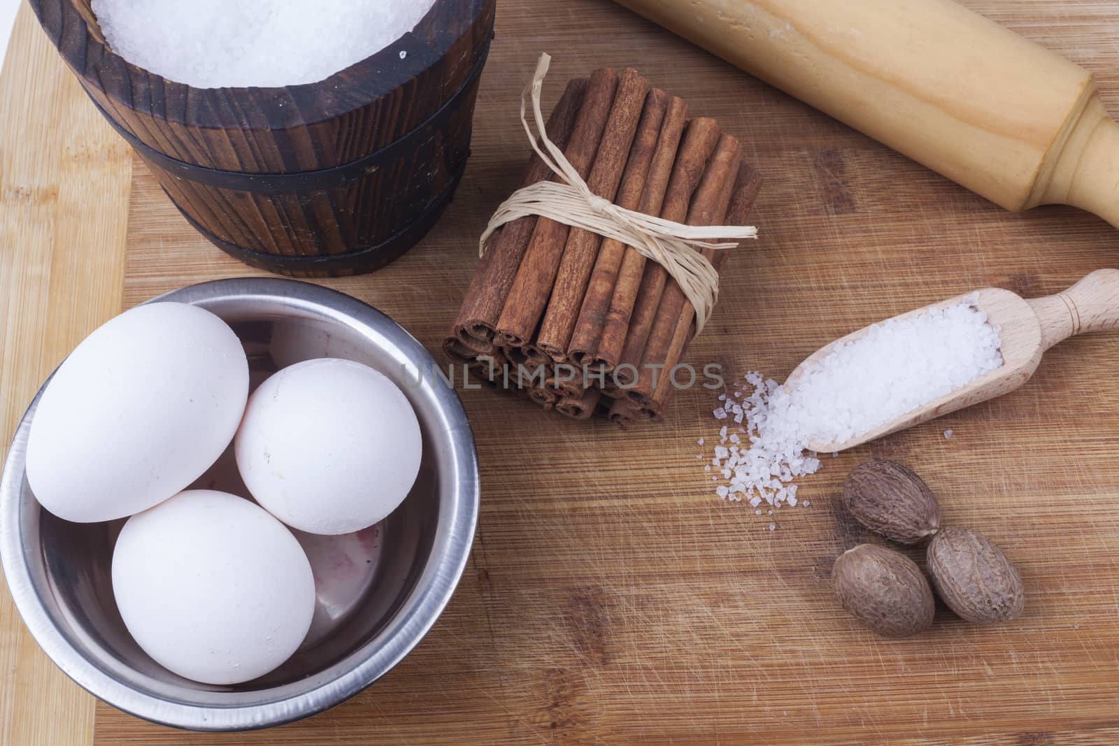 Baking ingredients preparation on brown wod board