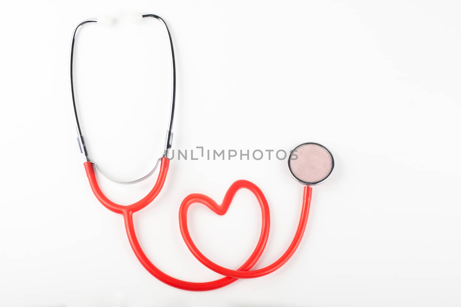 single red stethoscope isolated on white background