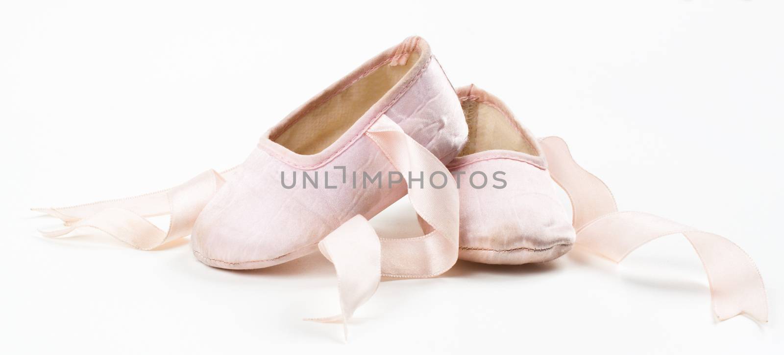 pink baby balerina shoes isolated on wite background