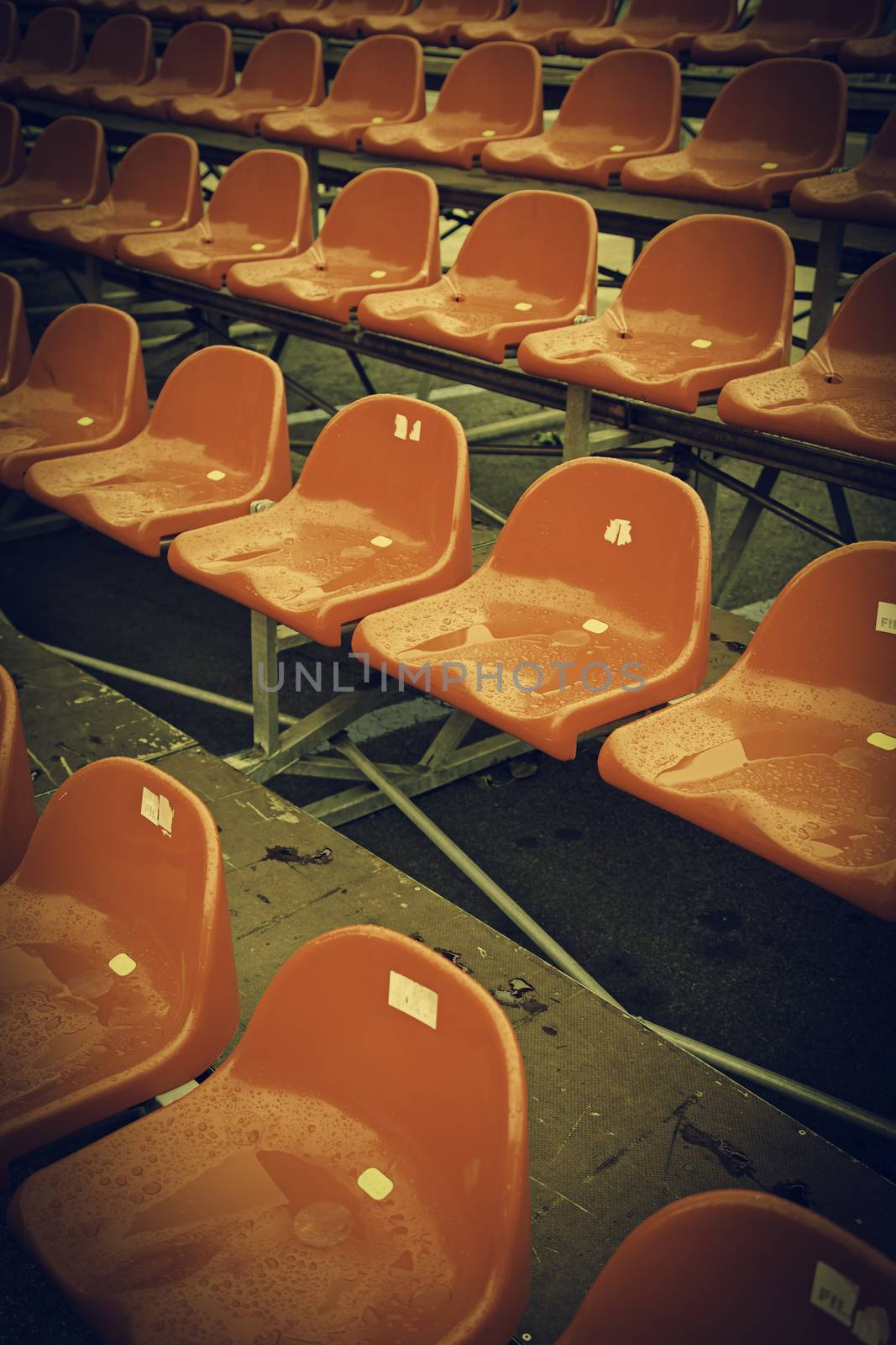 Bleachers for spectators, detail of red seats in a show, fun