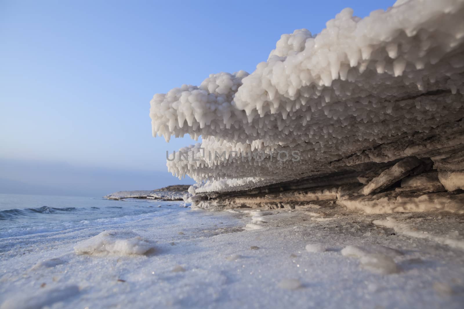 Salt Structures above an below with the sea in the background and a blue sky