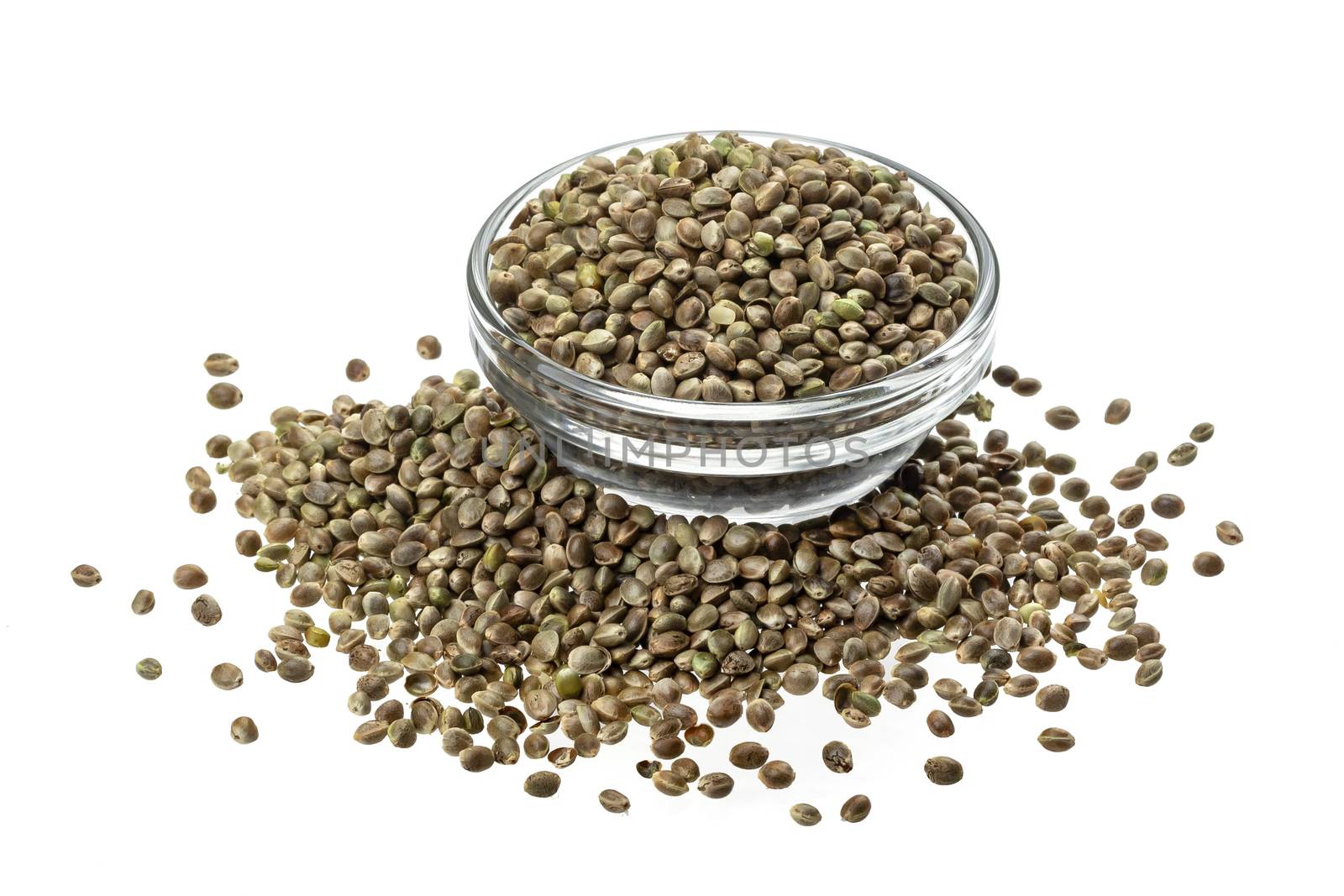 Hemp seeds in bowl isolated on white background with clipping path, heap of cannabis seeds, close up, macro