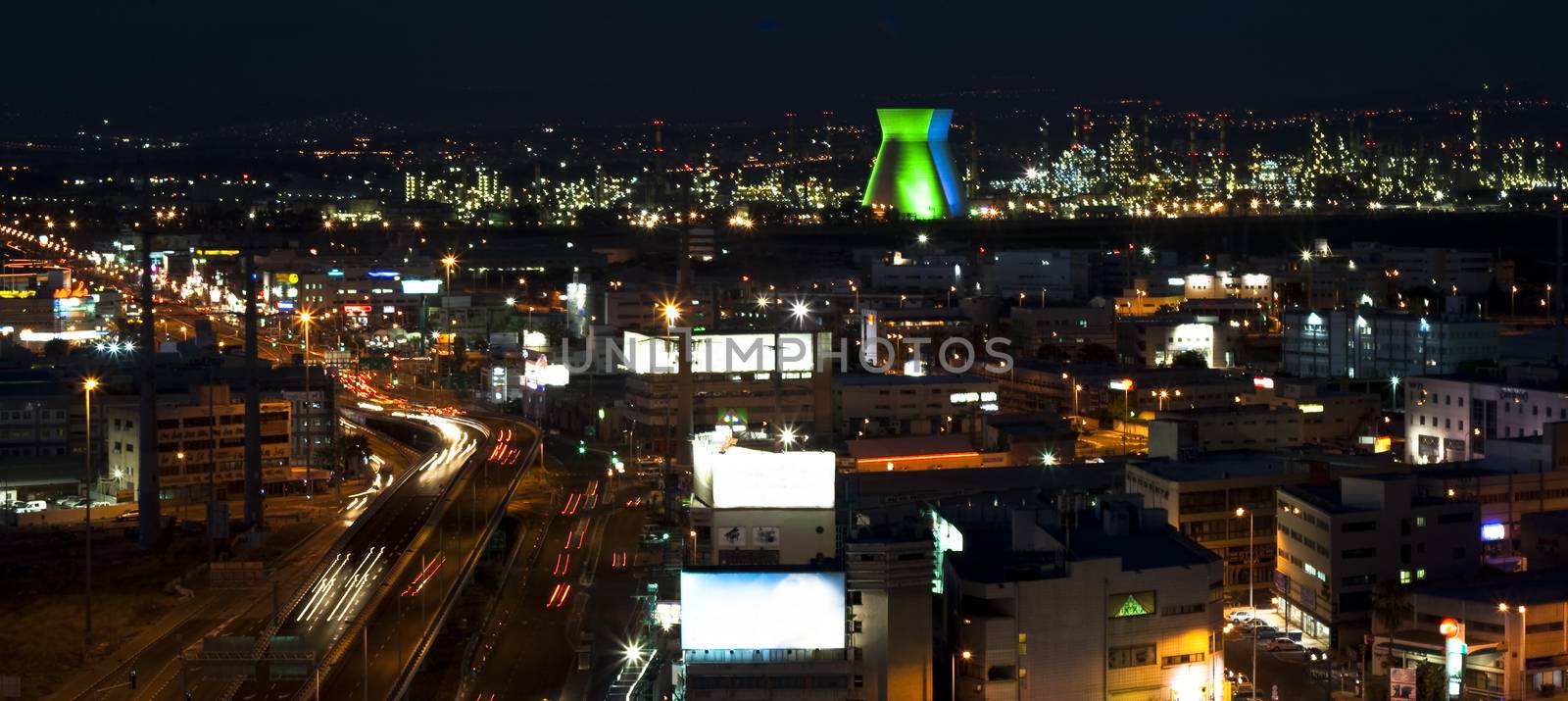 haifa bay industrial zone with a highway at night with blour's