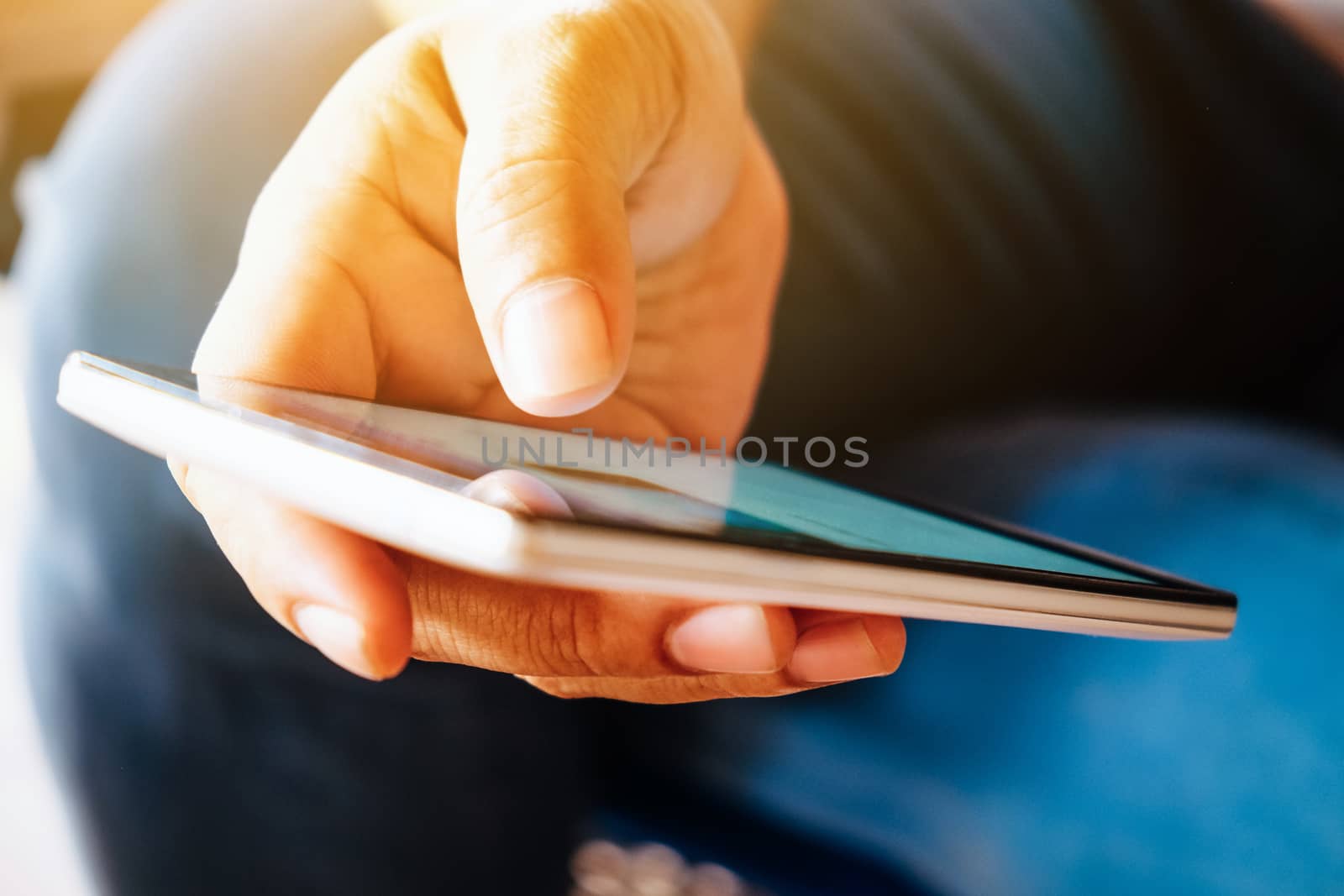 close up image of Phone on hands.