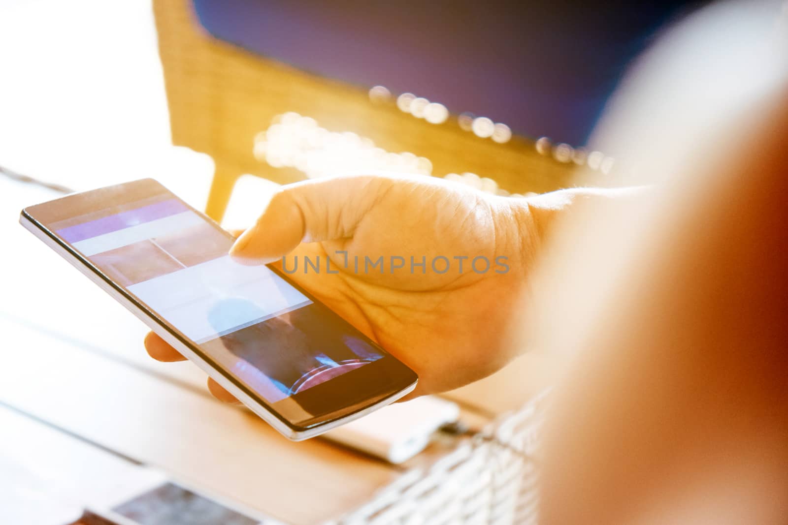 close up image of Phone on hands.