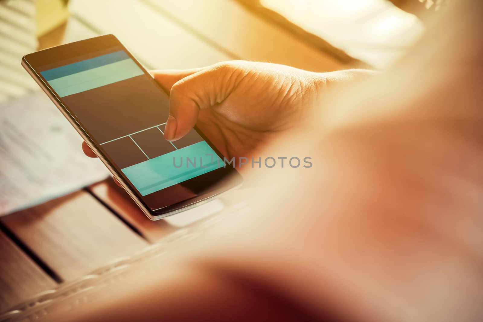 close up image of Phone on hands.