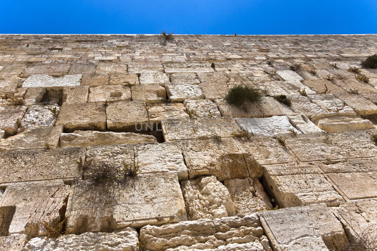 the western wall in jerusalem and blue sky