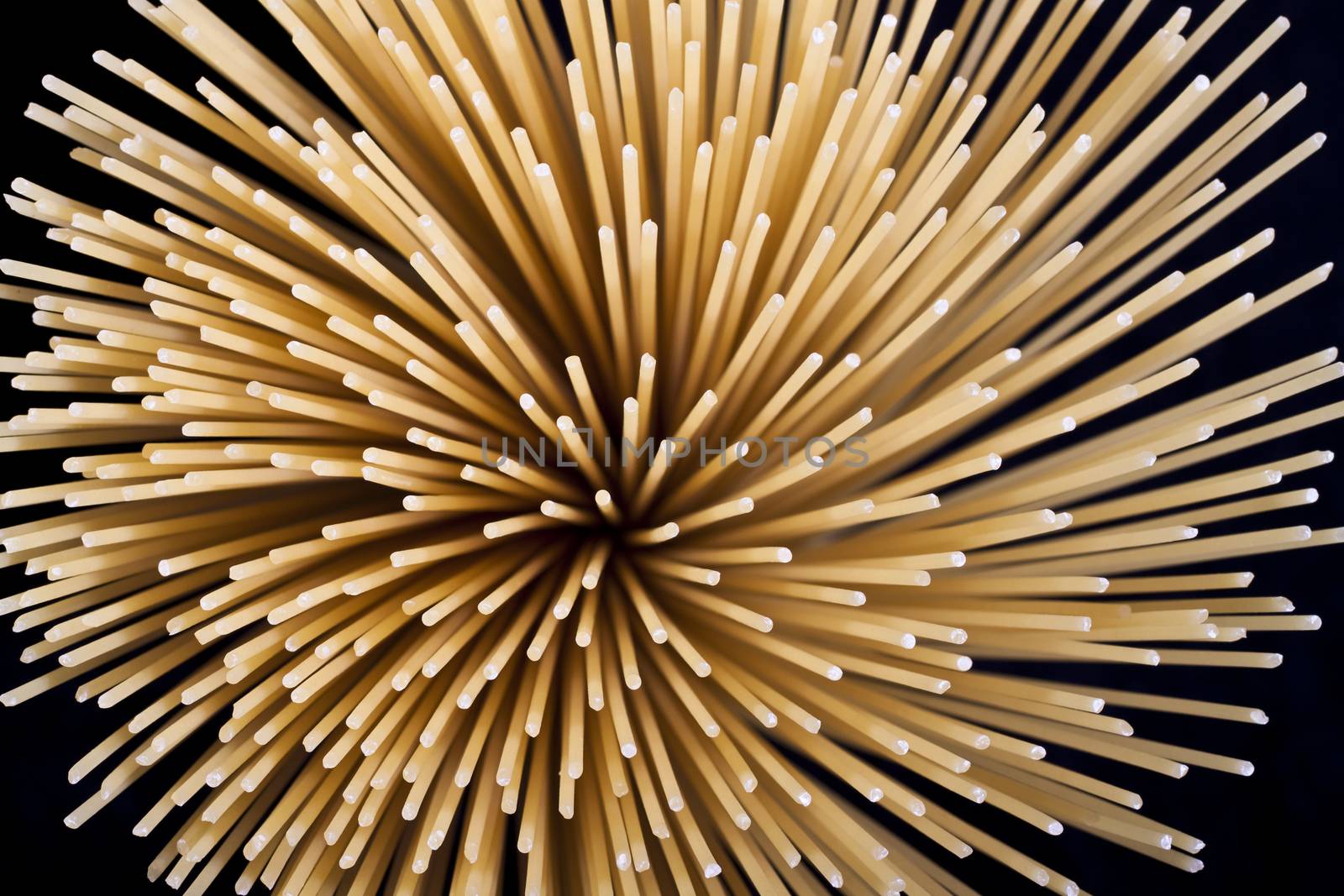 abstract spaghetti closeup on black background