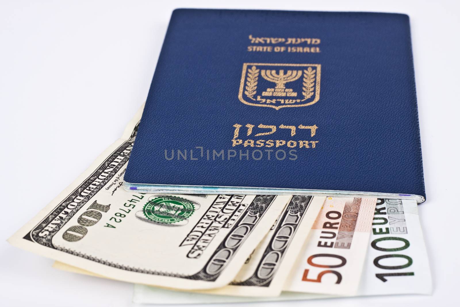 israeli passport and dollar bills isolated on white with cliping path