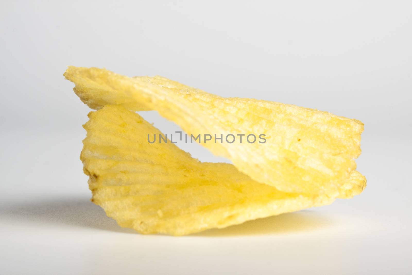 two chips sncaks on white background with shadow