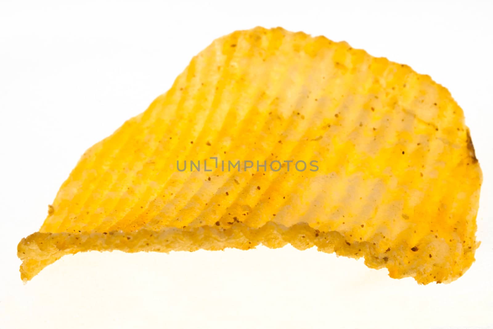 stipped and spiced golden chip on white background