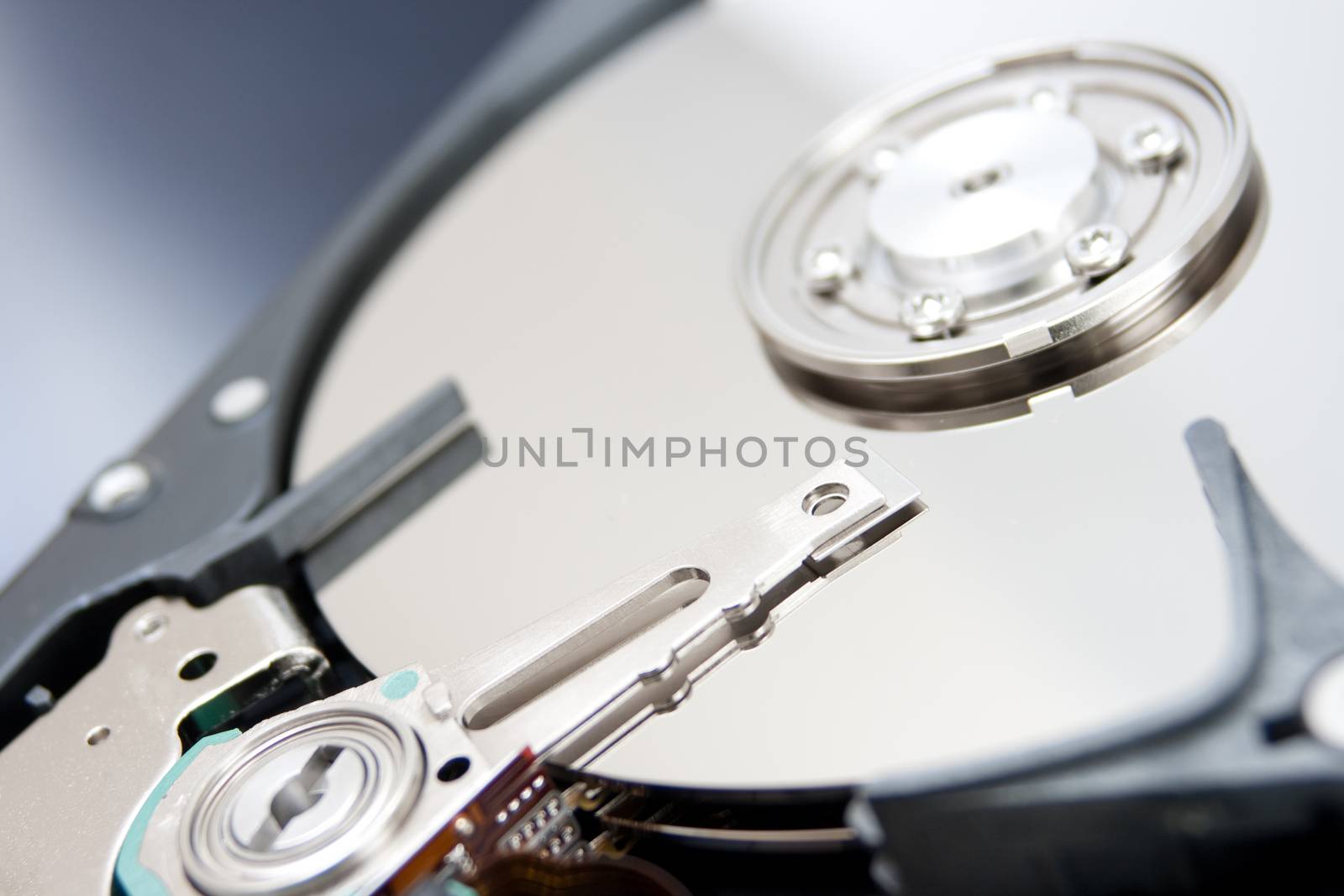 open hard drive disk reflection close-up
